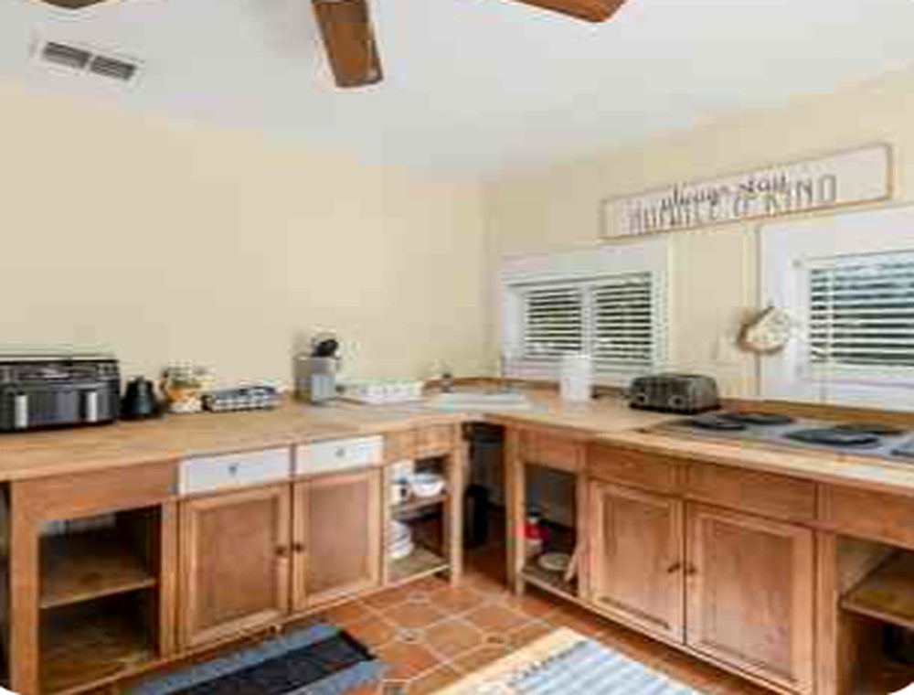 Upstairs kitchen cabinetry and counter area